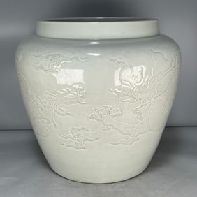A Exquisite White Glaze Auspicious Cloud Dragon and Phoenix Pattern Jar