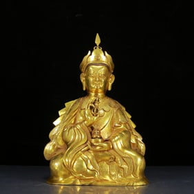 A Solemn Gilt Bronze Statue of Padma Sambhava