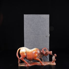 An Exquisite White Jade Buffalo Ornament