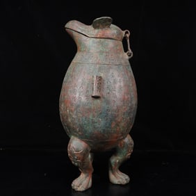 An Archaic Bronze Double-Ears and Tripod Zun,With Inscription