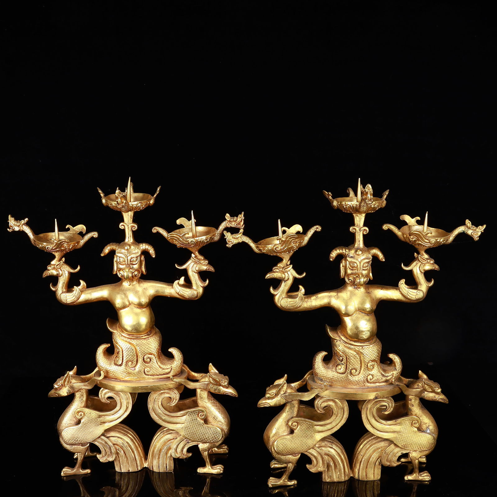 A Pair of Rare Gilt Bronze Figure Candlesticks: A Pair of Rare Gilt Bronze Figure Candlesticks,The Warring States period in China,Size:11.8inx2.8inx16.5in,Weight:10100g 一对铜鎏金人物烛台,ߑ