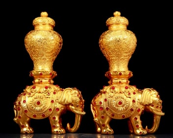 A pair of huge gilt bronze elephant vases inlaid gems