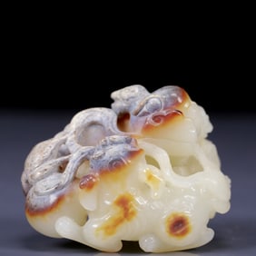 An Exquisite White Jade Lion Ornament