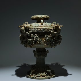 An Archaic Bronze Hollow Dragon Pattern Ornament