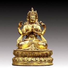 A Solemn Gilt Bronze Statue of Four-arms Guanyin