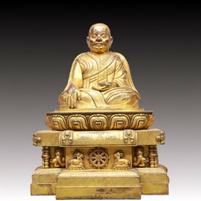 A Solemn Gilt Bronze Statue of Guru