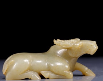 An Exquisite Greenish Jade Buffalo Ornament