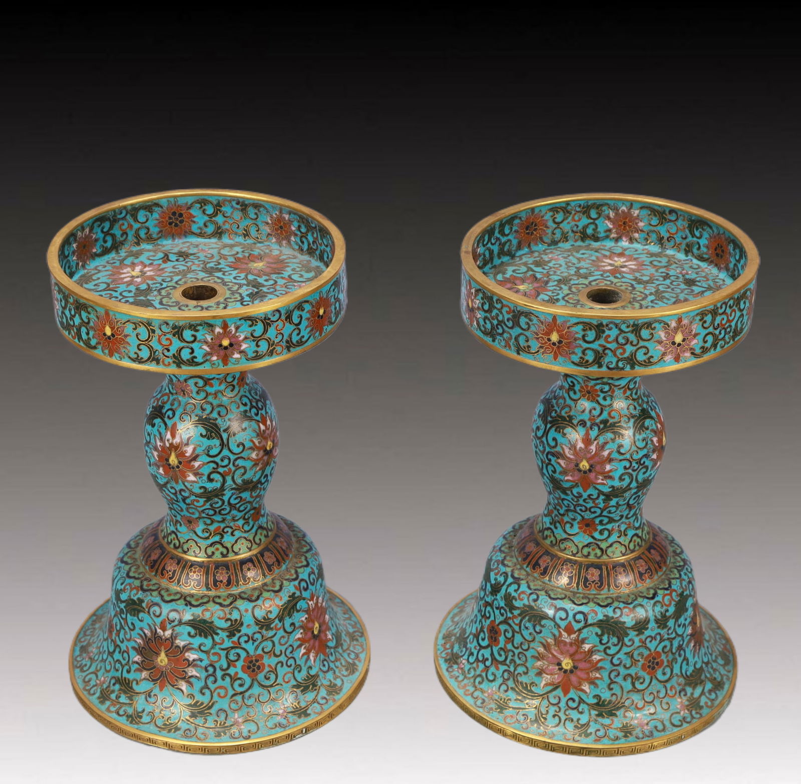 A Pair of Exquisite Cloisonne Lotus Pattern Candlesticks: A Pair of Exquisite Cloisonne Lotus Pattern Candlesticks,Qing Dynasty,China,Qianlong Four-character Mark,Size:7.3inx11in,Total Weight:4650g 一对景泰蓝缠枝!