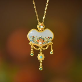 An Exquisite Sterling Silver-Gold Plated Inlaid White Jade Pendant