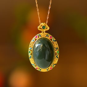 An Exquisite Sterling Silver-Gold Plated Inlaid Sapphire Pendant