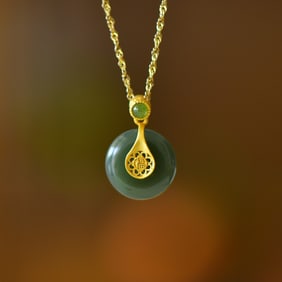 An Exquisite Sterling Silver-Gold Plated Inlaid Sapphire Pendant