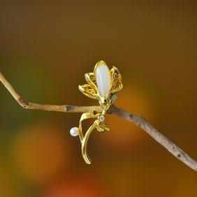 An Exquisite Sterling Silver-Gold Plated Inlaid White Jade Brooch
