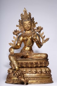 A Rare Gilt Bronze Carved Statue of Green Tara