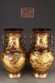 A pair of Gilt Red Copper Beast-Ears Vases