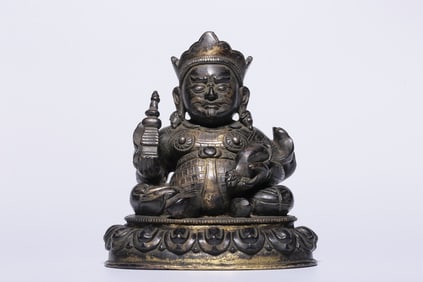 A Rare Gilt Bronze Statue of Vaisravana