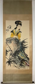 A Chinese Vertical Scroll Ink Painting of Figures on Paper