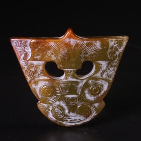 An Archaic Gaogu Jade Crown-Shaped Implement