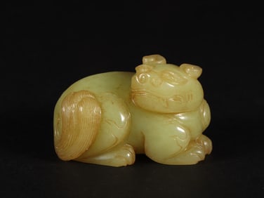 An Exquisite Yellow Jade Auspicious Beast Ornament