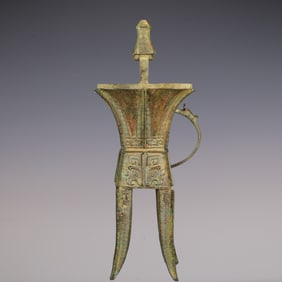 An Exquisite Bronze Beast-Face Pattern With Inscription Cup