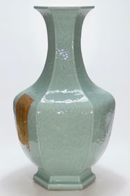 An Exquisite Celadon Glazed Dragon Pattern Vase