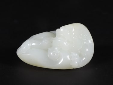 An Exquisite White Jade Auspicious Beast Ornament