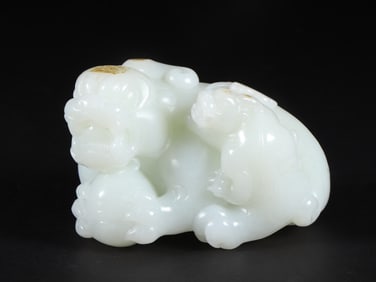 An Exquisite White Jade Auspicious Beast Ornament