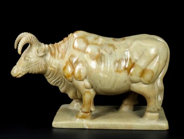 An Exquisite White Jade Buffalo Ornament