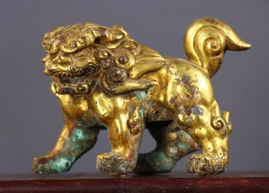 An Exquisite Gilt Bronze Lion Ornament