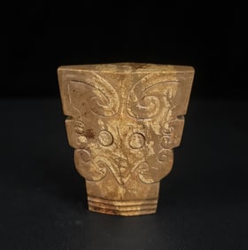 An Exquisite White Jade Beast-Face Pattern Ornament