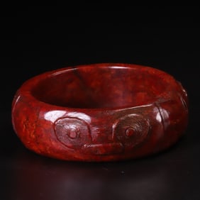 An Archaic Red Jade Bracelet