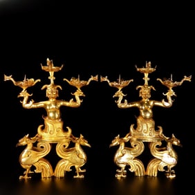 A pair of Exquisite Gilt Bronze Candlesticks