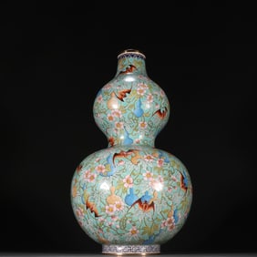 A Rare Green Ground Famille-Rose Gold-Painted Bat and Gourd Pattern Vase