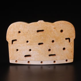 An Archaic Gaogu Jade Crown-Shaped Implement