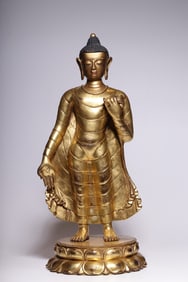 A Solemn Gilt Bronze Standing Statue of Vairocana Buddha