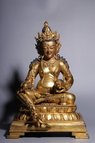 A Solemn Gilt Bronze Statue of Mammon