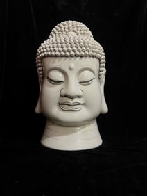 A Exquisite Blanc-De-Chine Buddha Head Ornament