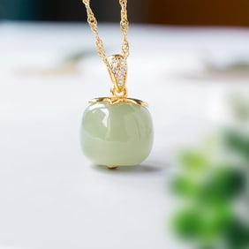 A Exquisite Silver Inlaid Hotan Jade Apple-shaped Pendant