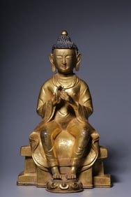 A Solemn Gilt Bronze Statue of Maitreya Buddha