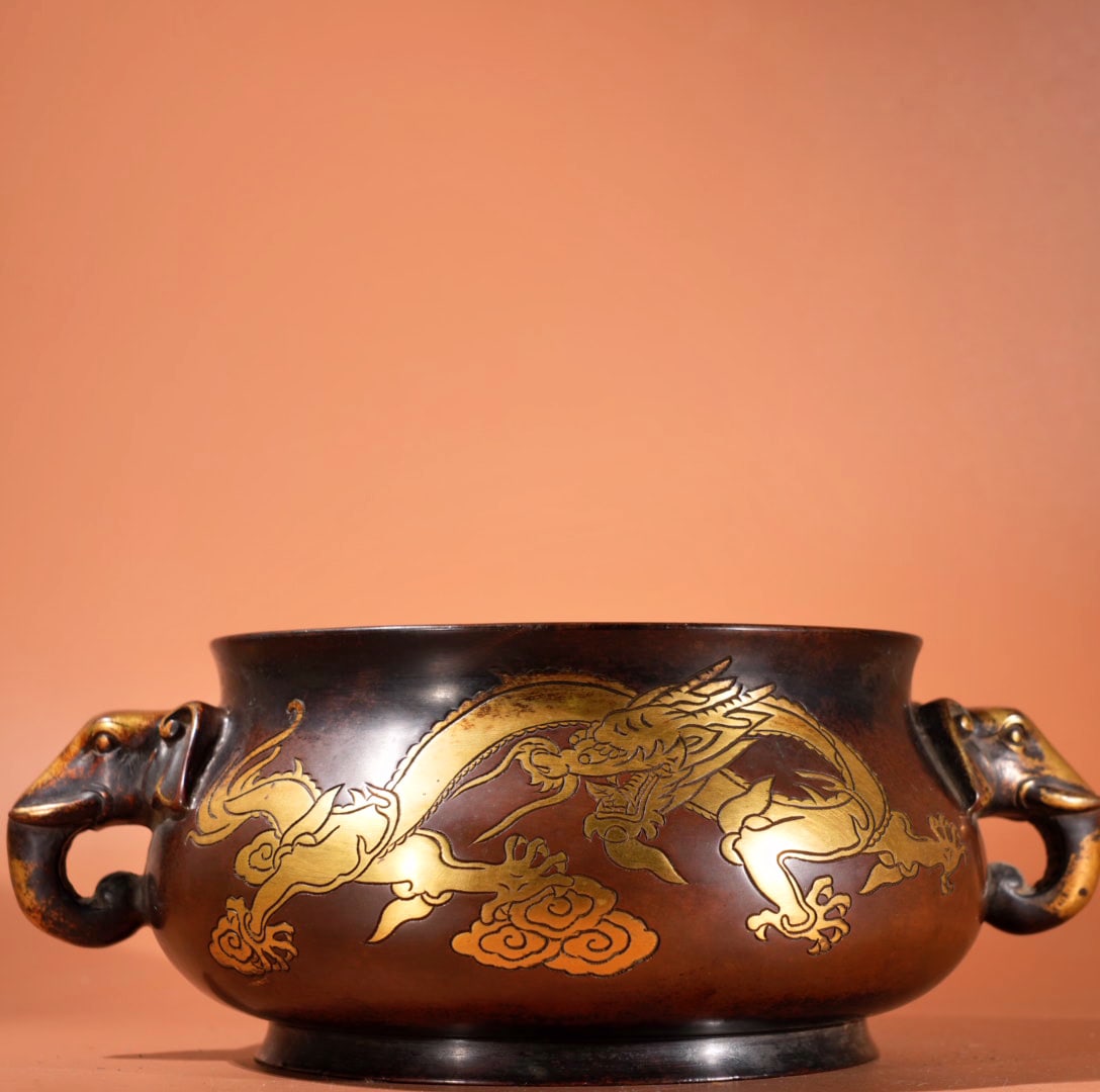 A Exquisite Red Copper Carved Pattern Gilt Dragon Pattern Elephant-Ear Censer: A Exquisite Red Copper Carved Pattern Gilt Dragon Pattern Elephant-Ear Censer,Ming Dynasty, China,Xuande Four-character Mark,Size:3.5inx5.7in, Weight:2650g 紫铜雕花鎏%