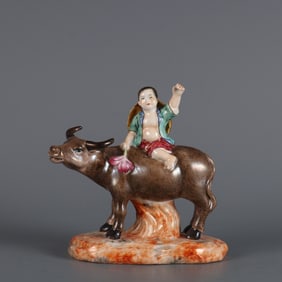 A Rare  Famille Rose Figure of Shepherd Boy Riding Yellow Ox