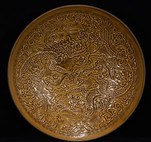 A Rare Ding yao Carved Dragon Pattern Bowl