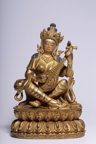 A Solemn Gilt Bronze Statue of Saraswati