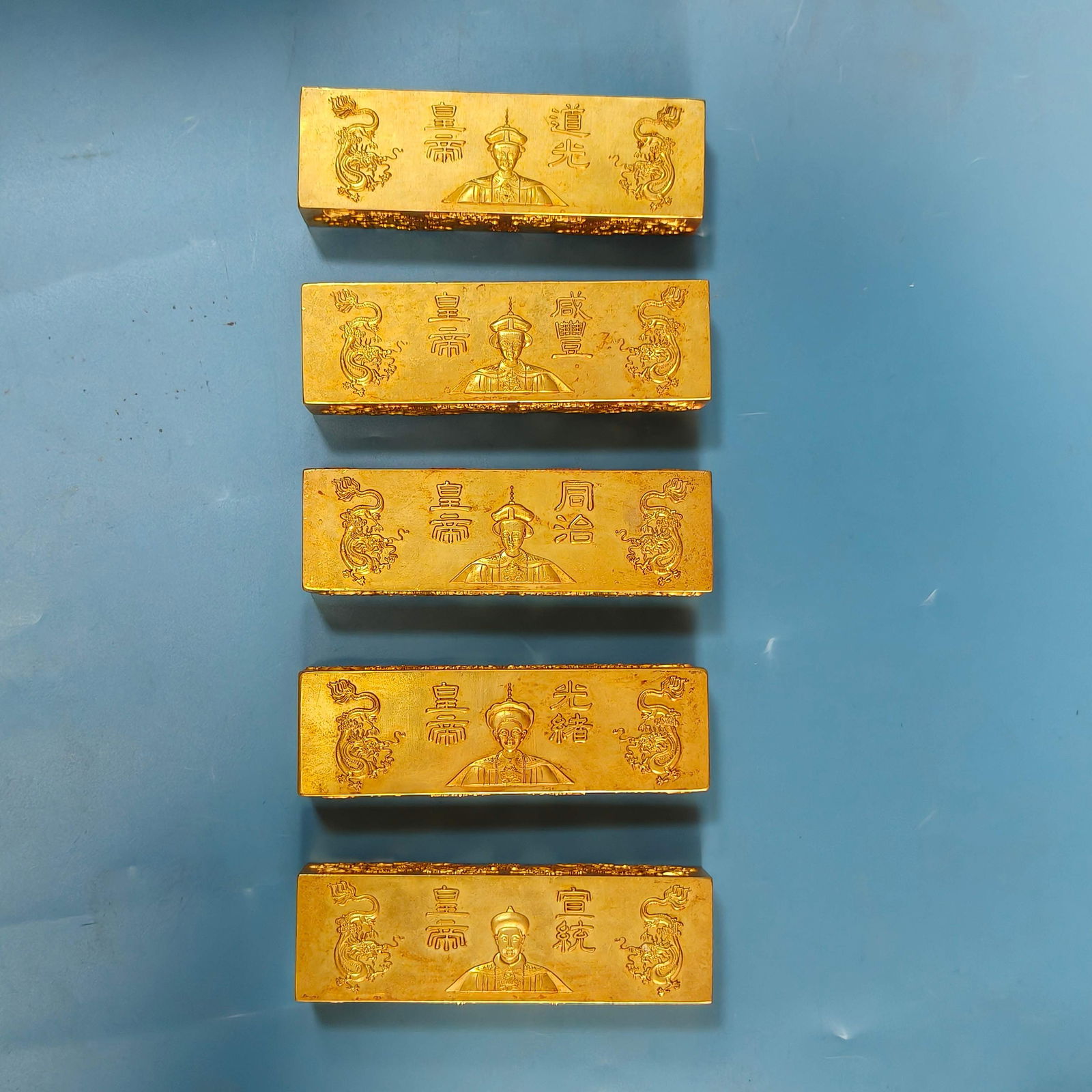 A Set of Exquisite Bronze Gilt Human and Dragon Pattern Gold Bar (1 of 4)