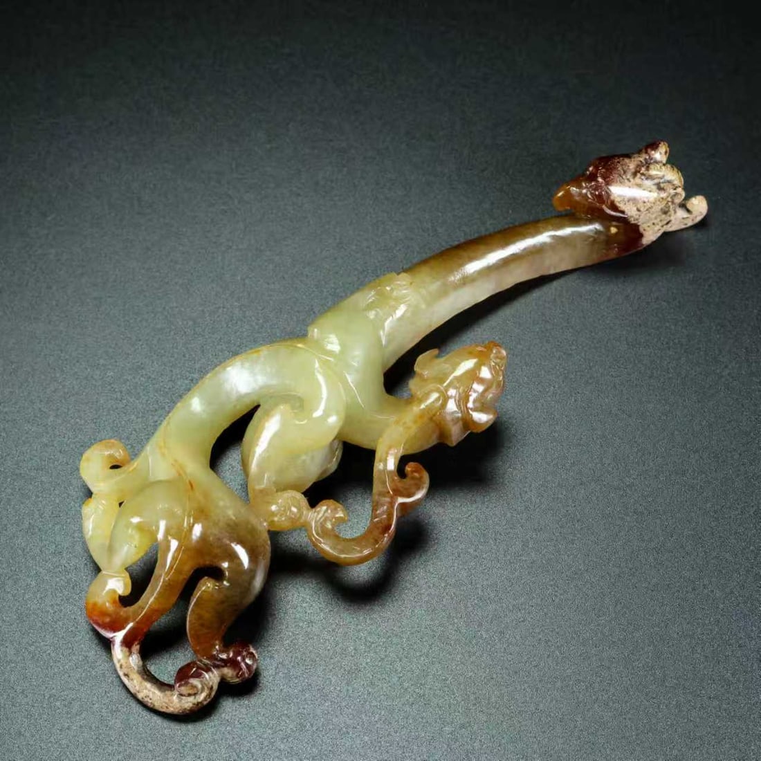 A Exquisite Hotan Jade Dragon Ornament: A Exquisite Hotan Jade Dragon Ornament,Han Dynasty, China 和田玉龙带勾,中国汉代