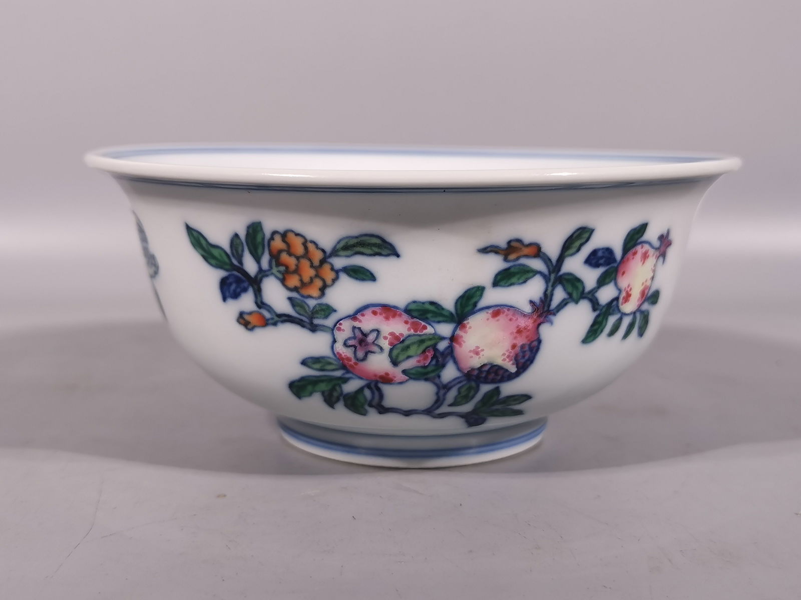A Exquisite Blue and White Doucai Pomegranate Pattern Bowl: A Exquisite Blue and White Doucai Pomegranate Pattern Bowl,Qing Dynasty,China,Yongzheng Six-character Mark,Size:2.6inx5.7in 