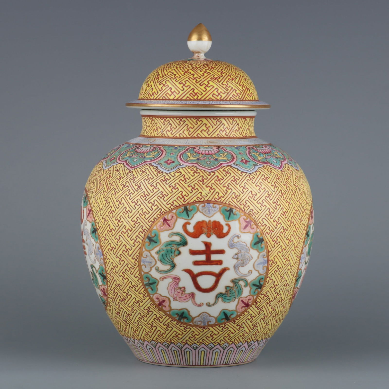 A Rare Yellow Ground Famille Rose Gilded Five Blessings Pattern Covered Jar: A Rare Yellow Ground Famille Rose Gilded Five Blessings Pattern Covered Jar,Qing Dynasty, China,Qianlong Six-character Mark,Size:10.4inx3.5in 