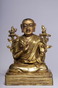 A Solemn Gilt Bronze Statue of Guru Kunga Gyaltsen