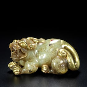 A Rare Hetian Jade Gold-Inlaid Beast