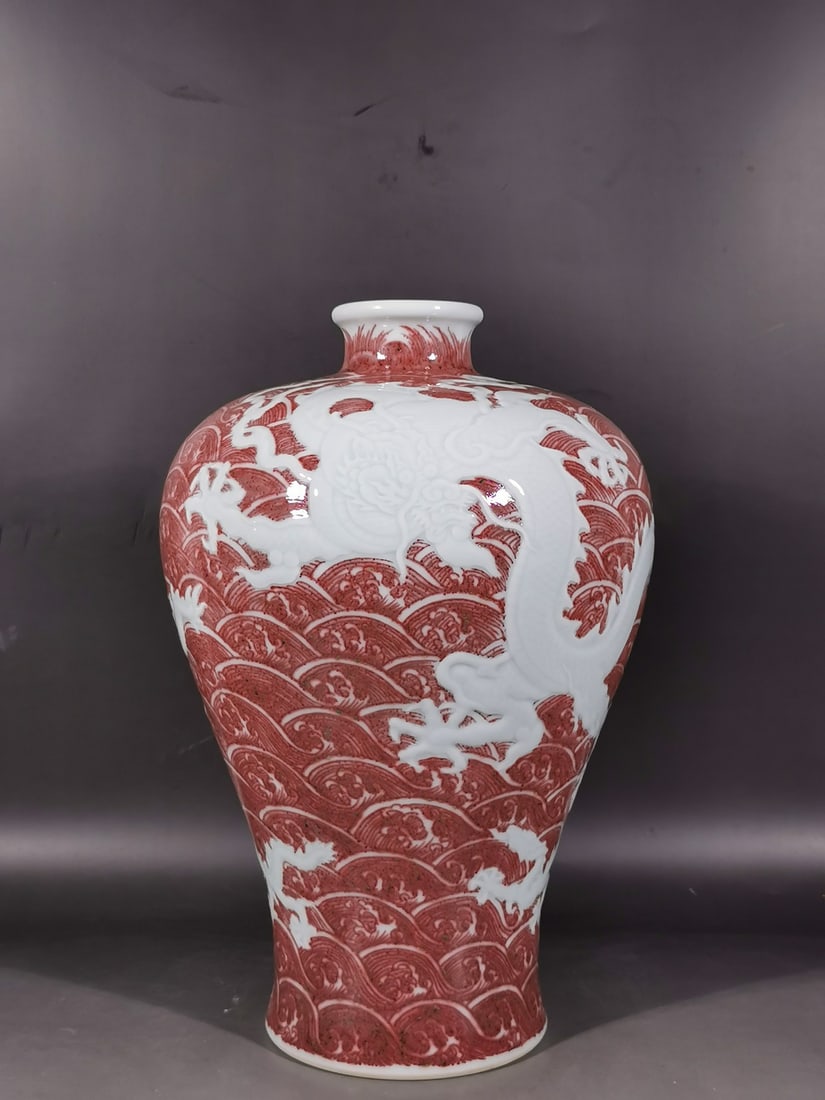 A Exquisite Underglaze-Red Seawater Dragon Pattern Vase: A Exquisite Underglaze-Red Seawater Dragon Pattern Vase,Qing Dynasty,China,Yongzheng Six-character Mark,Size:13.8inx9.4in 釉里红海水龙纹梅瓶,È