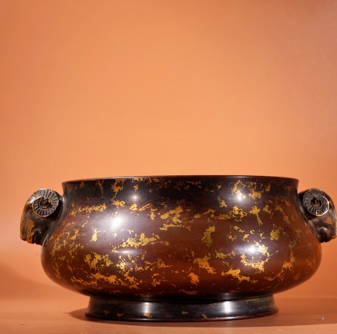 A Exquisite Red Copper Sprinkled Gold Double-Ear Sheep-Head Censer: A Exquisite Red Copper Sprinkled Gold Double-Ear Sheep-Head Censer,Ming Dynasty, China,With Mark,Size:3.7inx6.6in, Weight:3475g 